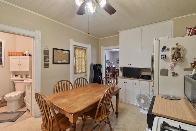 904 E Madison St, Pontiac, IL 61764 - dining area with ceiling fan and light tile patterned flooring