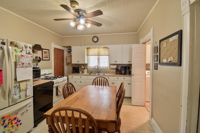 904 E Madison St, Pontiac, IL 61764 - kitchen featuring white appliances, white cabinetry, ceiling fan, light countertops, and crown molding