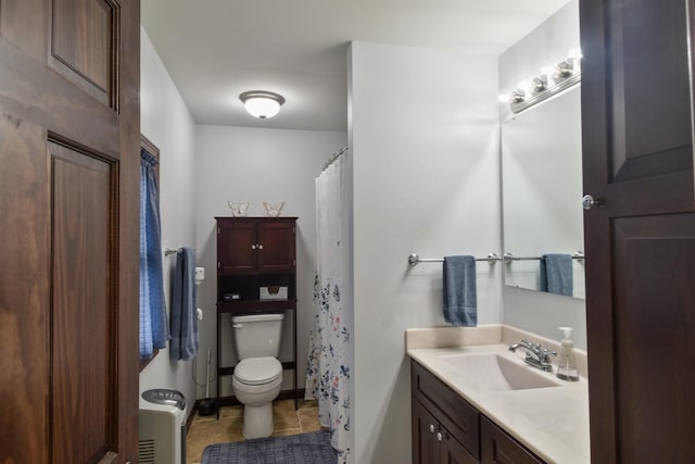 904 E Madison St, Pontiac, IL 61764 - bathroom with vanity, tile patterned flooring, and a shower with shower curtain