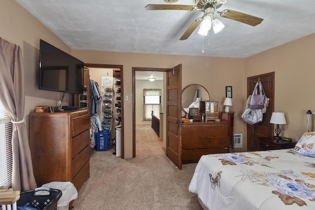 904 E Madison St, Pontiac, IL 61764 - bedroom featuring light colored carpet and ceiling fan