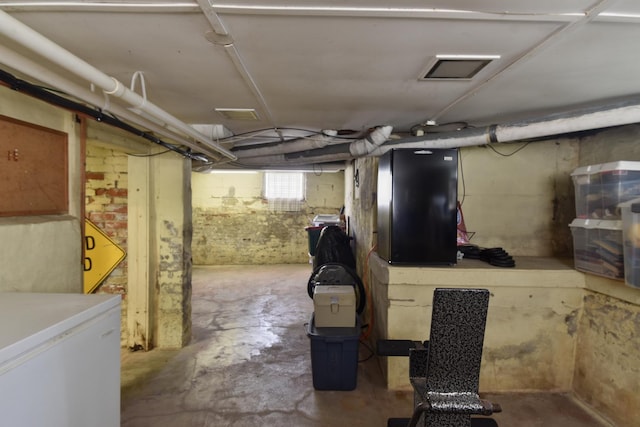 904 E Madison St, Pontiac, IL 61764 - below grade area featuring fridge