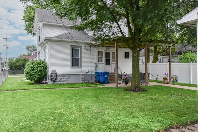 904 E Madison St, Pontiac, IL 61764 - rear view of property with entry steps and a shingled roof