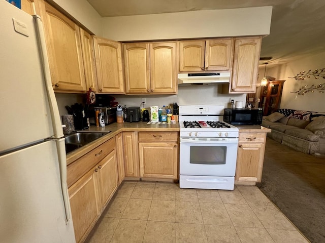 1405 W Beech St, Urbana, IL 61801 - kitchen with white appliances, under cabinet range hood, light brown cabinets, light tile patterned flooring, and a sink