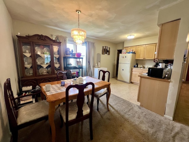 1405 W Beech St, Urbana, IL 61801 - dining space with a chandelier and light tile patterned floors
