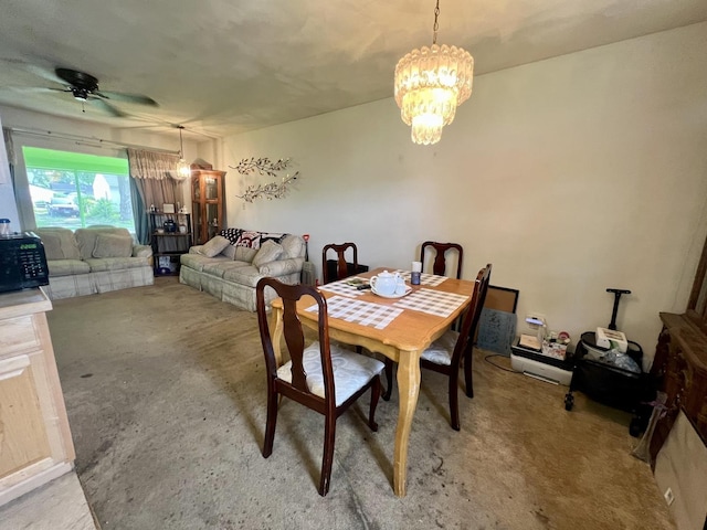 1405 W Beech St, Urbana, IL 61801 - dining space featuring a chandelier, ceiling fan, and light colored carpet