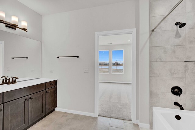 3245 Lincoln Prairie Blvd, Aurora, IL 60503 - full bath featuring vanity, tub / shower combination, tile patterned floors, a water view, and baseboards