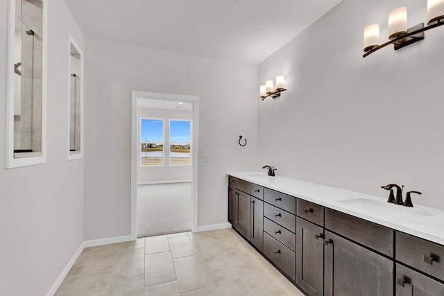 3245 Lincoln Prairie Blvd, Aurora, IL 60503 - bathroom featuring double vanity, baseboards, tile patterned flooring, and a shower