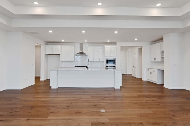 3245 Lincoln Prairie Blvd, Aurora, IL 60503 - kitchen featuring wall chimney exhaust hood, built in microwave, oven, white cabinets, and recessed lighting