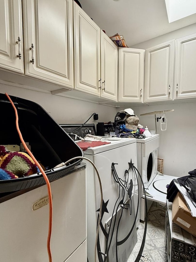1545 Winnetka Rd Unit 1545, Glenview, IL 60025 - washroom featuring cabinet space and washing machine and dryer
