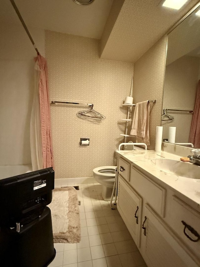1545 Winnetka Rd Unit 1545, Glenview, IL 60025 - full bathroom with vanity, toilet, tile patterned flooring, and a shower with curtain