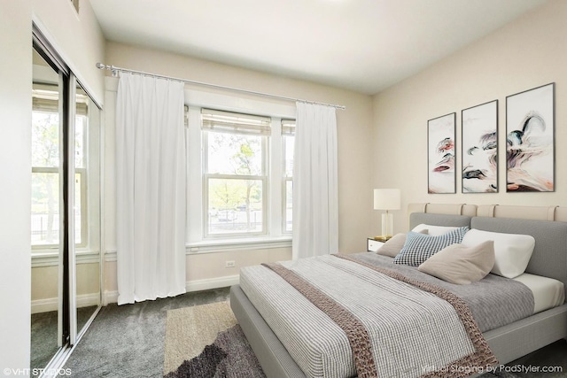 4148 N Clarendon Ave Unit 102, Chicago, IL 60613 - carpeted bedroom featuring multiple windows