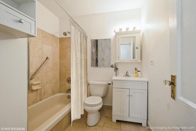 4148 N Clarendon Ave Unit 102, Chicago, IL 60613 - bathroom with vanity, tiled shower / bath combo, and tile patterned floors