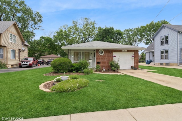 611 Palace St, Aurora, IL 60506 - view of front of home featuring brick siding, a garage, concrete driveway, and a front yard