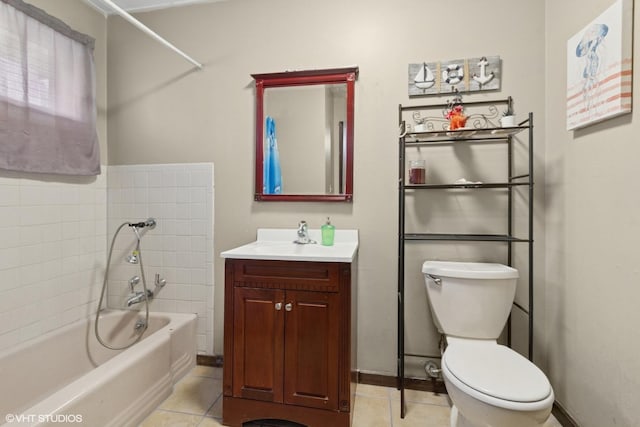 611 Palace St, Aurora, IL 60506 - full bathroom featuring a bath, tile patterned flooring, vanity, toilet, and baseboards