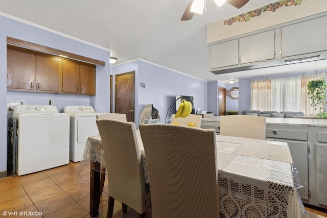 611 Palace St, Aurora, IL 60506 - dining room featuring independent washer and dryer, crown molding, ceiling fan, and light tile patterned flooring