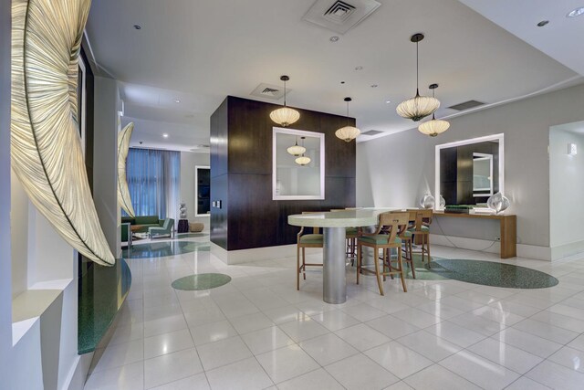 125 S Green St Unit 705A, Chicago, IL 60607 - dining area featuring light tile patterned flooring, recessed lighting, and baseboards
