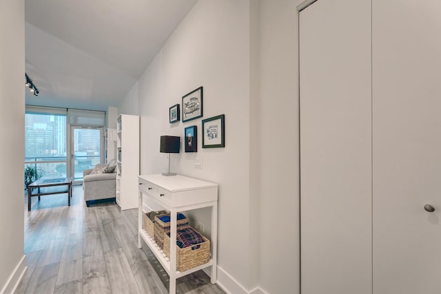 125 S Green St Unit 705A, Chicago, IL 60607 - corridor with light wood finished floors and track lighting