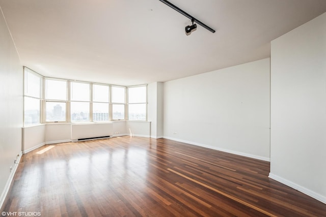 525 W Hawthorne Pl Unit 2701, Chicago, IL 60657 - unfurnished room with wood finished floors and baseboards