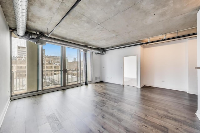 700 W Van Buren St Unit 1301, Chicago, IL 60607 - spare room with wood finished floors and baseboards