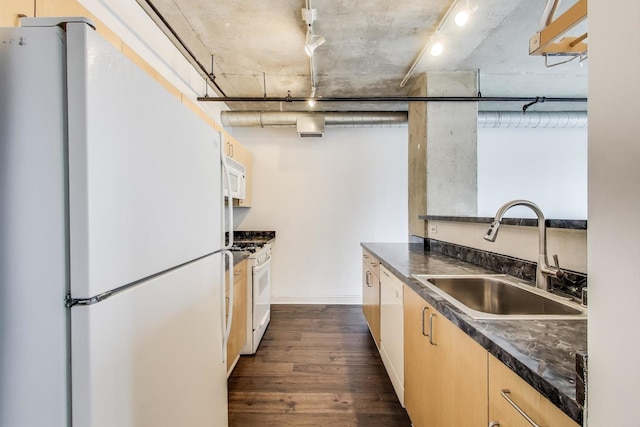 700 W Van Buren St Unit 1301, Chicago, IL 60607 - kitchen with white appliances, a sink, dark countertops, dark wood-type flooring, and light brown cabinetry