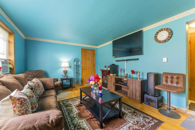 6850 Cermak Rd Unit Gb, Berwyn, IL 60402 - living area featuring wood finished floors, ornamental molding, and baseboards