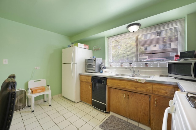 6850 Cermak Rd Unit Gb, Berwyn, IL 60402 - kitchen with white appliances, a sink, brown cabinets, light tile patterned floors, and tile countertops