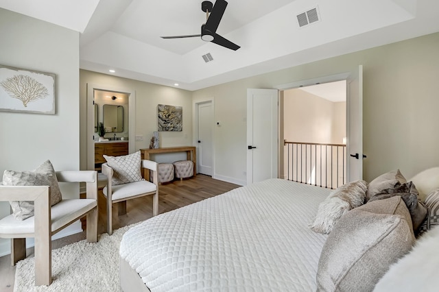 4468 Clausen Ave, Western Springs, IL 60558 - bedroom with light wood finished floors, connected bathroom, a raised ceiling, recessed lighting, and a ceiling fan