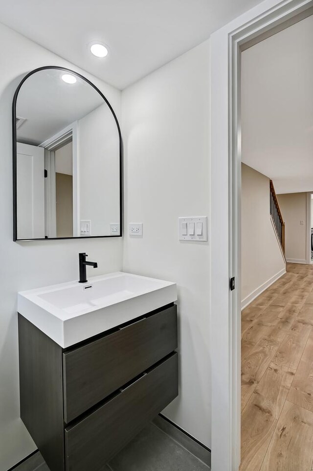 4468 Clausen Ave, Western Springs, IL 60558 - bathroom with wood finished floors, vanity, recessed lighting, and baseboards