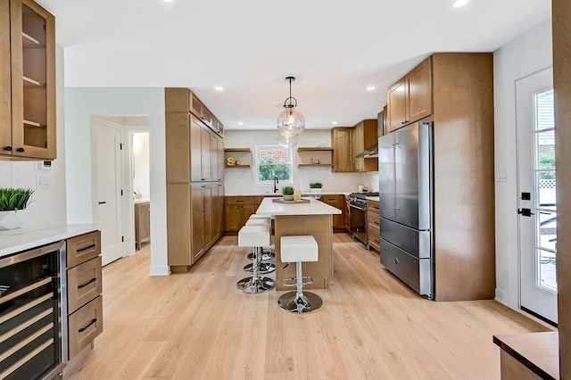 4468 Clausen Ave, Western Springs, IL 60558 - kitchen featuring beverage cooler, open shelves, premium appliances, brown cabinetry, and recessed lighting