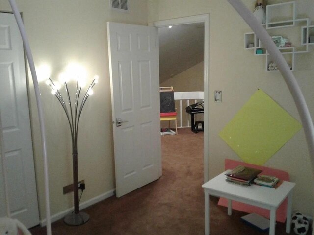 121 Chatsworth Cir, Schaumburg, IL 60194 - hall with carpet floors and vaulted ceiling