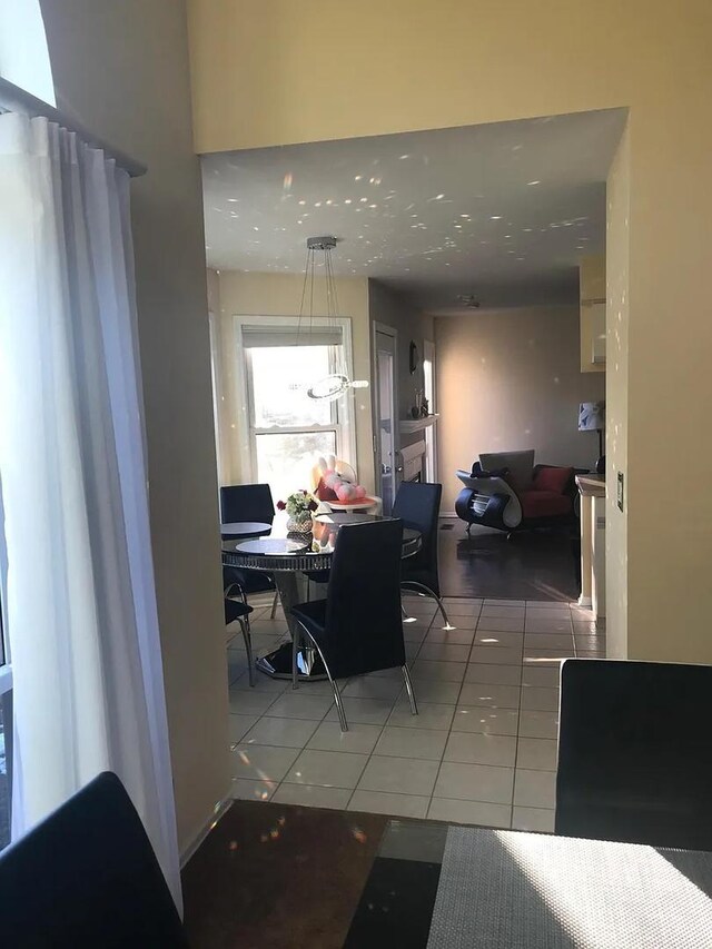 121 Chatsworth Cir, Schaumburg, IL 60194 - dining space featuring light tile patterned flooring