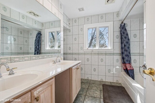 20832 Sparta Ln, Olympia Fields, IL 60461 - full bathroom featuring tile walls, tile patterned flooring, double vanity, and shower / bathtub combination with curtain