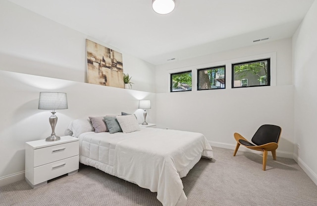 4102 W Eddy St, Chicago, IL 60641 - bedroom with baseboards and light colored carpet