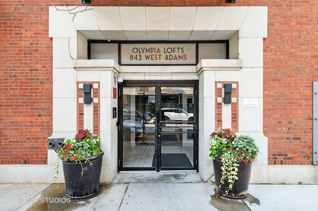 843 W Adams St Unit 310, Chicago, IL 60607 - entrance to property with french doors and brick siding