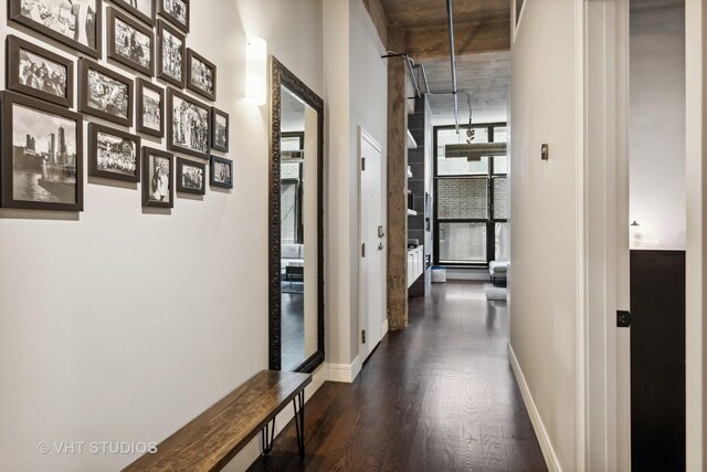 843 W Adams St Unit 310, Chicago, IL 60607 - hallway featuring dark wood-type flooring and baseboards