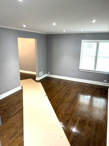 1900 W 83rd St Unit 0, Chicago, IL 60620 - unfurnished room with dark wood-style flooring, recessed lighting, and crown molding