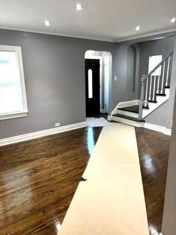 1900 W 83rd St Unit 0, Chicago, IL 60620 - foyer with arched walkways, dark wood-type flooring, ornamental molding, stairs, and recessed lighting