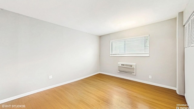 1567 Ridge Ave Unit 307, Evanston, IL 60201 - unfurnished bedroom with light wood-type flooring, a closet, and heating unit