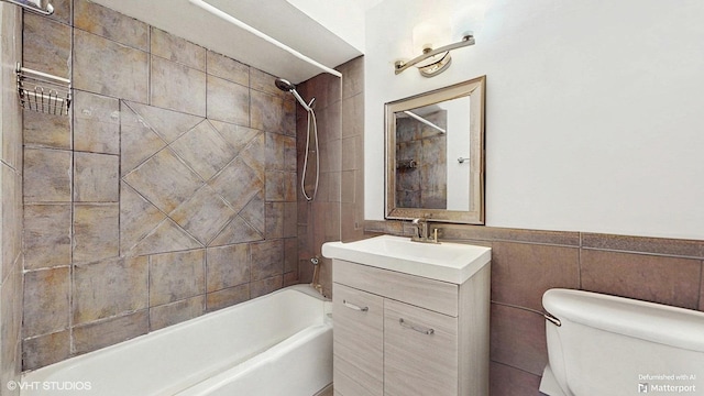 1567 Ridge Ave Unit 307, Evanston, IL 60201 - bathroom with tub / shower combination, vanity, and tile walls