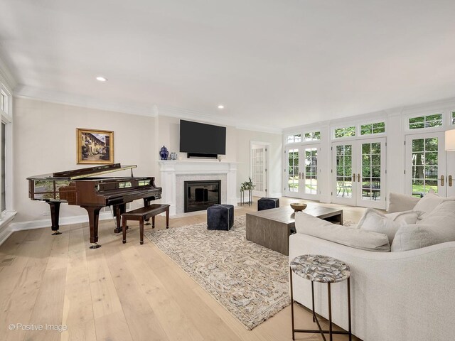 1360 Turvey Rd, Downers Grove, IL 60515 - living area with french doors, crown molding, a fireplace with flush hearth, light wood-style floors, and recessed lighting