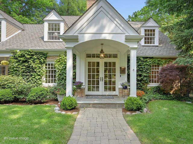 1360 Turvey Rd, Downers Grove, IL 60515 - property entrance with a chimney, french doors, a yard, and a porch