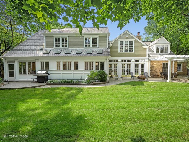 1360 Turvey Rd, Downers Grove, IL 60515 - rear view of house with french doors, a pergola, a patio, a yard, and a fire pit