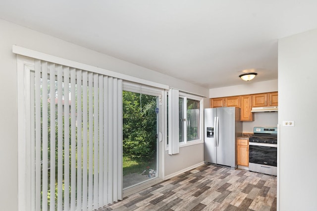 2265 Windsor Ln, Country Club Hills, IL 60478 - kitchen featuring stainless steel appliances, under cabinet range hood, light wood-style flooring, and baseboards