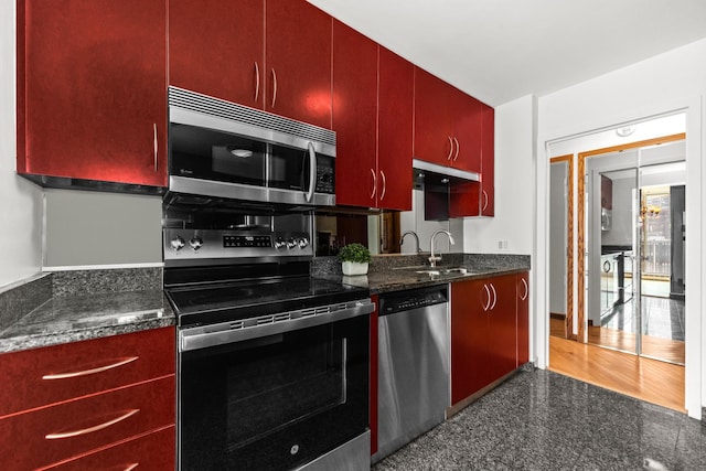 4170 N Marine Dr Unit 6L, Chicago, IL 60613 - kitchen featuring stainless steel appliances, dark countertops, a sink, and granite floors