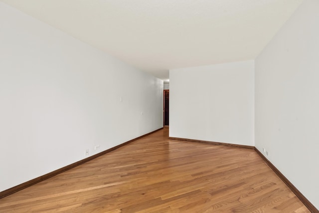 4170 N Marine Dr Unit 6L, Chicago, IL 60613 - unfurnished room with light wood finished floors and baseboards