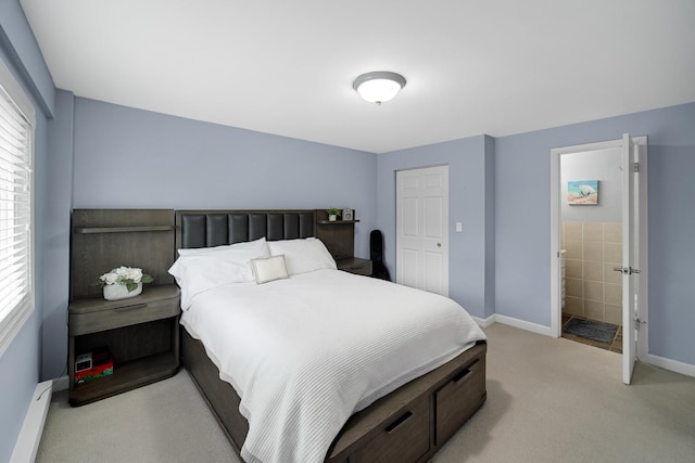 7830 W N Ave Unit 306, Elmwood Park, IL 60707 - bedroom with light carpet, baseboards, a baseboard radiator, and a closet