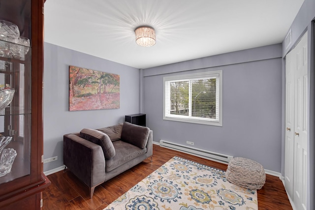 7830 W N Ave Unit 306, Elmwood Park, IL 60707 - living area with a baseboard heating unit, baseboards, and dark wood-style flooring