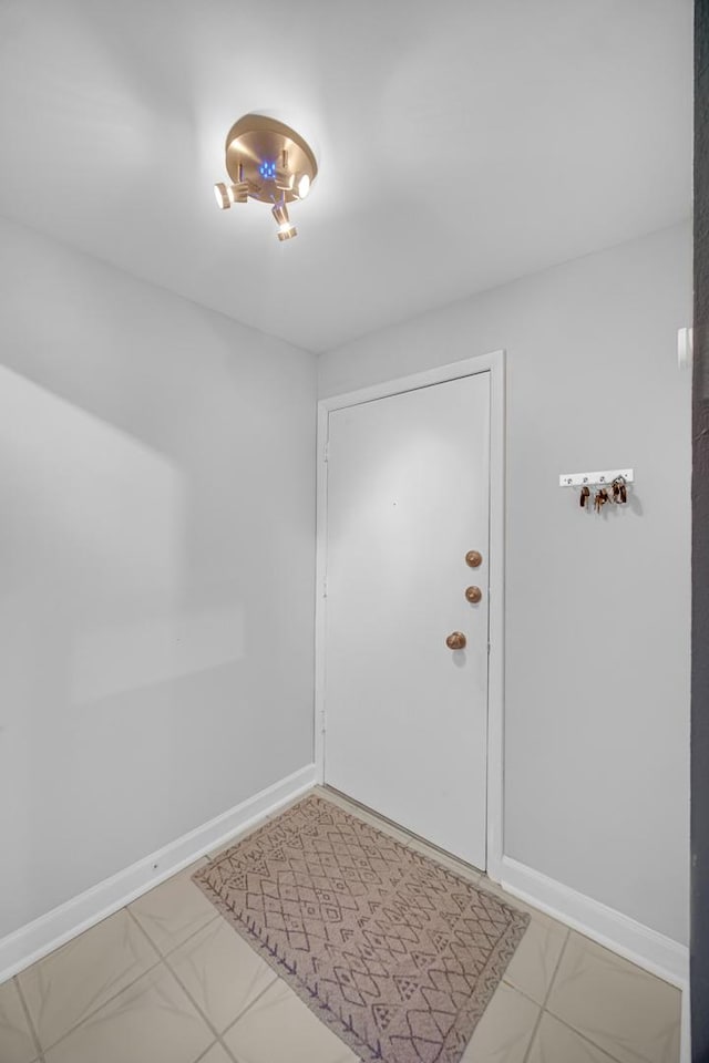 7830 W N Ave Unit 306, Elmwood Park, IL 60707 - foyer entrance with light marble finish floors and baseboards