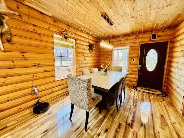 3515 Union Ave, Steger, IL 60475 - dining room with wood ceiling, light wood-type flooring, healthy amount of natural light, and log walls