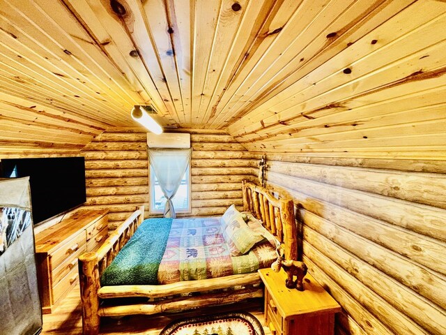 3515 Union Ave, Steger, IL 60475 - bedroom featuring wood ceiling and rustic walls